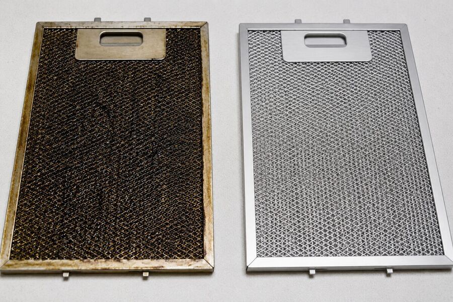 Kitchen chimney baffle filter before and after professional deep cleaning — grease build-up fully removed